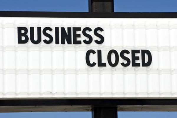 A sign indicates that a business is closed