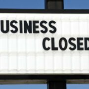 A sign indicates that a business is closed