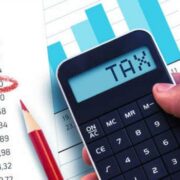 A calculate shows the word "tax"